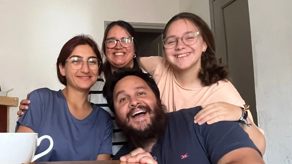 Two women, one young girl and a man